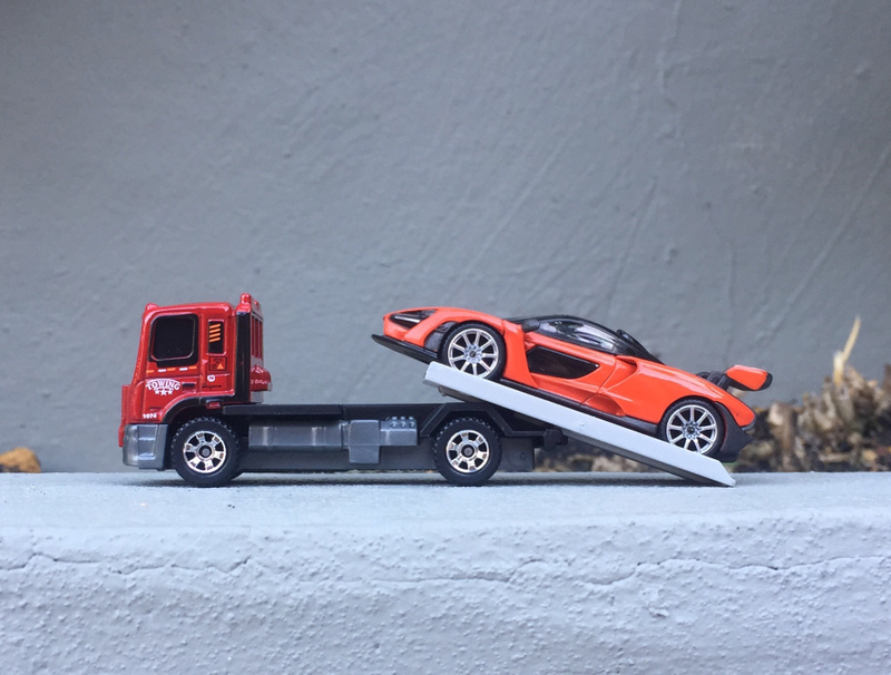 Illustration for article titled McLaren Monday - Mira Orange delivery with Matchbox Flatbed King!